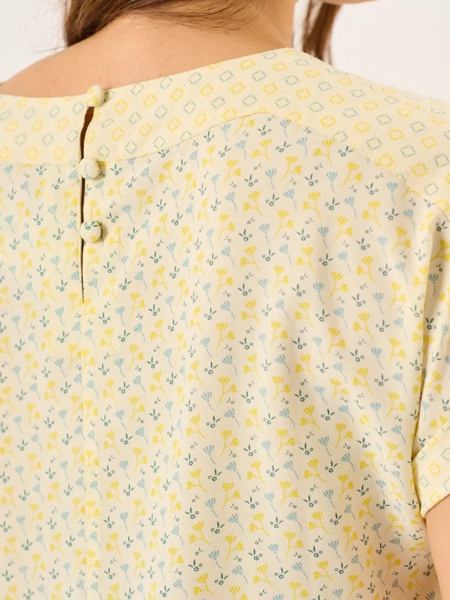 light_yellow_floral_short_9.webp Quba & Co Light Yellow Floral Short Sleeved Overhead Top - Dana Outlet